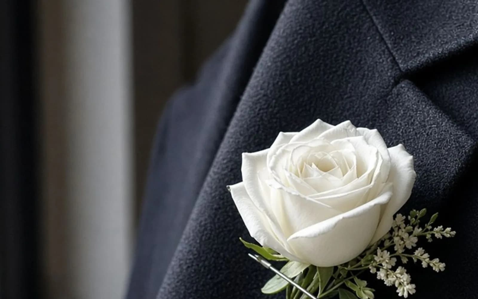 The same crop of a boutonniere on a wool lapel without the blur damage, kept for comparison.