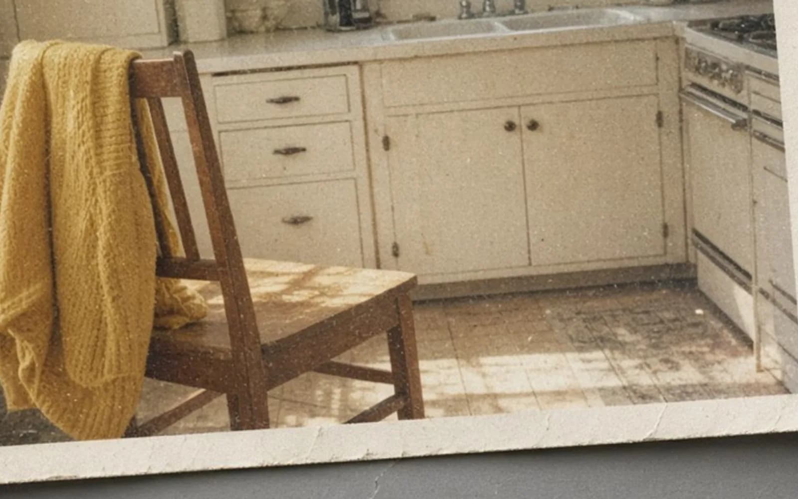 The same crop of a faded kitchen snapshot lying on a table without the age damage, kept for comparison.