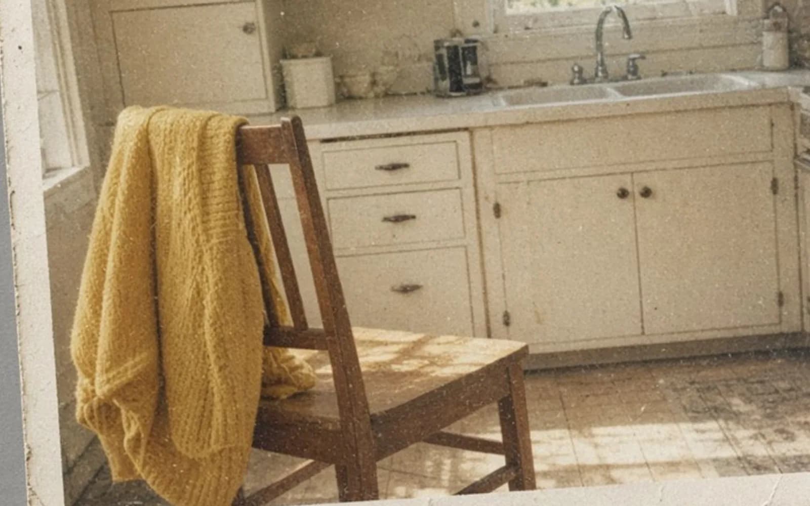 The same crop of a faded kitchen snapshot lying on a table without the age damage, kept for comparison.